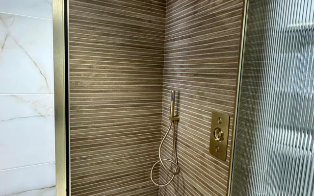 Shower Enclosure featuring a Brushed Gold Concealed Valve Shower, and a Handheld Shower | B-Spoke Bathroom Showroom Cardiff